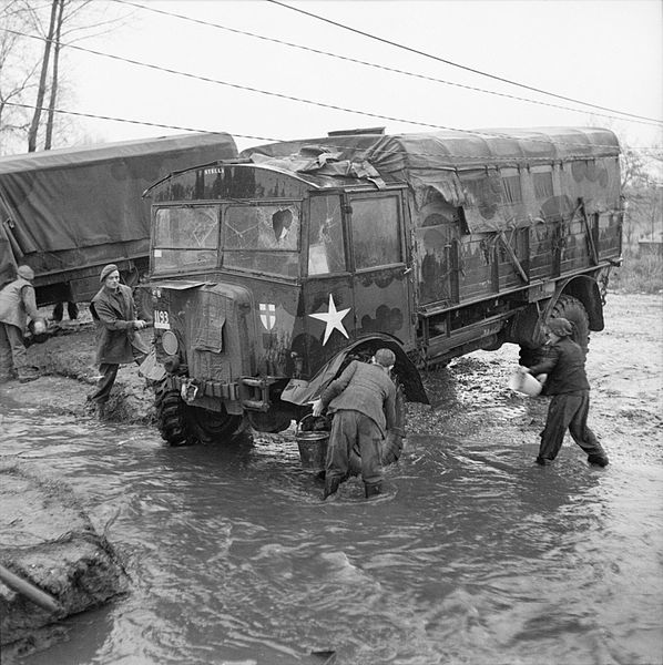 Dutch and British troops trying to clean a Matador